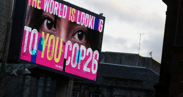 An advertising board is seen during the UN Climate Change Conference (COP26), in Glasgow, Scotland, Britain, November 7, 2021 Reuters/strong>