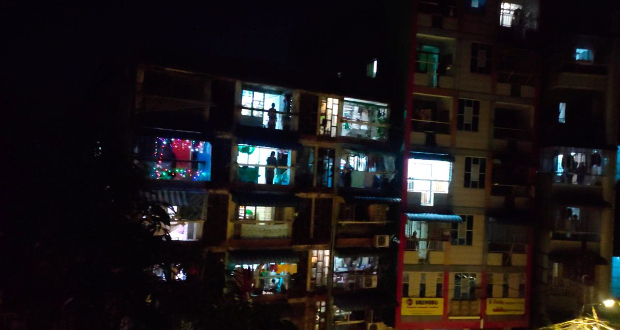Yangon residents beat on pots and pans to protest against the brutal crackdown by coup soldiers' over a peaceful protest, in Kyimyindaing Township, Yangon, Myanmar December 5, 2021, in this image obtained by Reuters from a social media video.