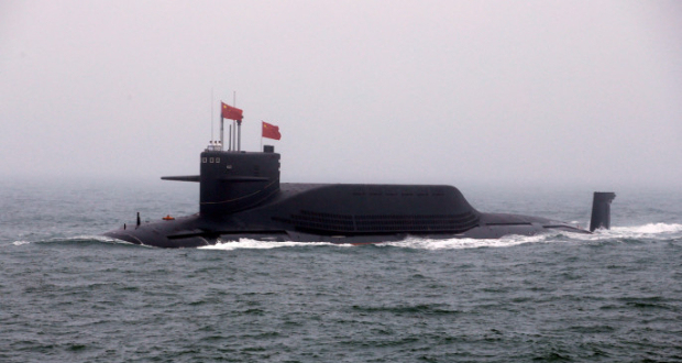 FILE PHOTO: Chinese Navy's nuclear-powered submarine Long March 11 takes part in a naval parade off the eastern port city of Qingdao, to mark the 70th anniversary of the founding of Chinese People's Liberation Army Navy, China, April 23, 2019. REUTERS/Jason Lee/File Photo