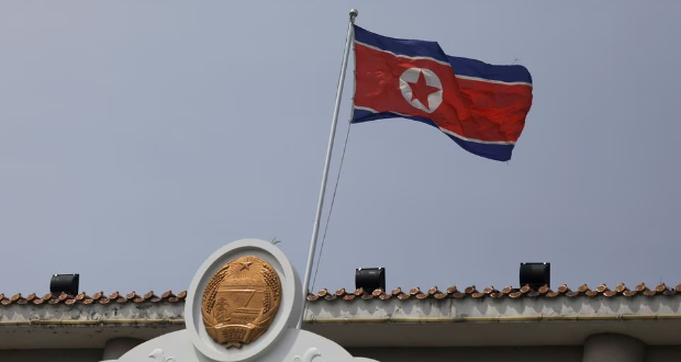 The North Korean flag flutters at the North Korea consular office in Dandong, Liaoning province, China April 20, 2021. Picture taken April 20, 2021. REUTERS/Tingshu Wang/File Photo