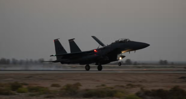 A US Air Force F-15E. The US has carried out airstrikes on an Iran-linked weapons storage facility in Syria in response to attacks on US forces in the region, the Pentagon has said. Photograph: Josephine Pepin/US AIR FORCE/AFP/Getty Images