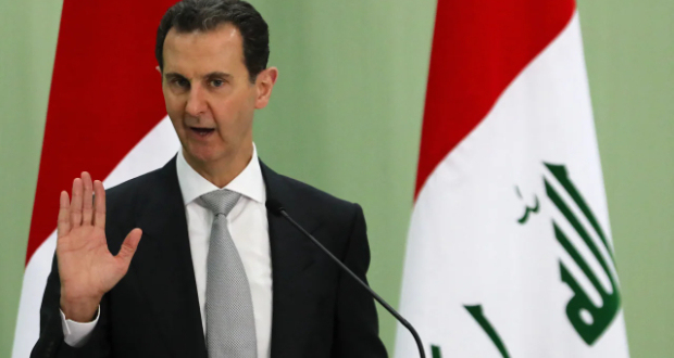 Syria's President Bashar al-Assad speaks during a press conference with Iraq's Prime Minister in Damascus on July 16, 2023 (Photo by LOUAI BESHARA / AFP)