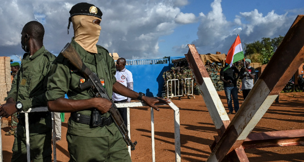 Niger security officers outside Niger and French airbase in Niamey, Niger.Photographer: AFP/Getty Images