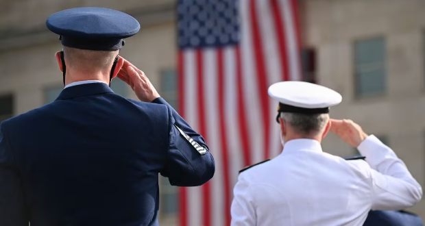 Members of the military salute during the 19th annual September 11 observance ceremony at the Pentagon in Arlington, Virginia, U.S., September 11, 2020. REUTERS/Erin Scott/ File Photo