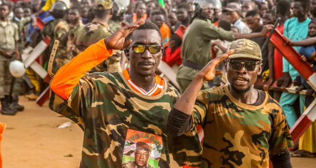 Niger's military-government supporters take part in a demonstration in front of a French army base in the capital Niamey [File: Mahamadou Hamidou/Reuters]