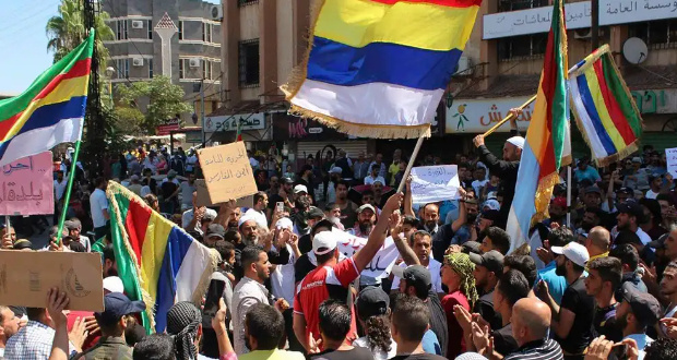 Protesters in southern Syria hoisted the multicolored flags of the Druze community at demonstrations