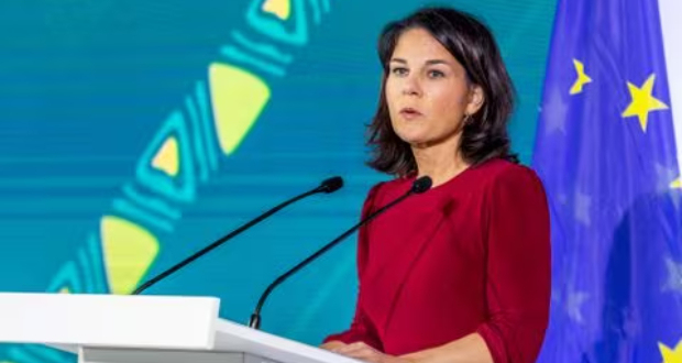 Germany's Foreign Minister Annalena Baerbock addresses delegates during the opening of German pharmaceuticals company BioNtech mRNA vaccine manufacturing plant to serve the African market in Kigali, Rwanda December 18, 2023. REUTERS/Jean Bizimana/File Photo