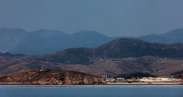 North Korea's Hwanghae province is seen from Yeonpyeong Island, South Korea, Saturday, Jan. 6, 2024. The influential sister of North Korean leader Kim Jong Un mocked South Korea’s ability to detect weapons launches by the North on Sunday, as she denied Seoul’s claim that North Korea fired artillery shells into the sea the previous day. South Korea's military quickly dismissed her statement as “a low-level psychological warfare" and warned that it will make a stern response to any provocations by
