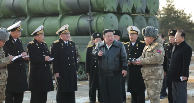 Kim Jong Un attends an inspection test of a new surface-to-sea missile [KCNA via Reuters]