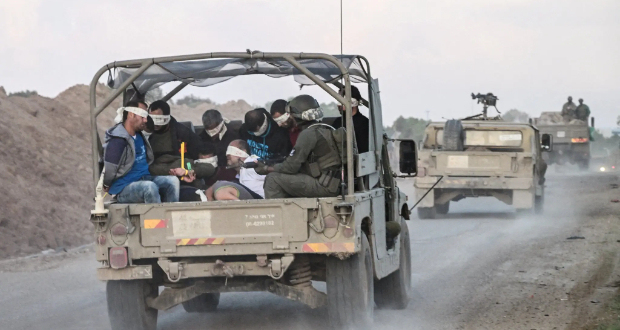 Israeli forces transporting detainees from the Gaza Strip in November.Credit...Yossi Zeliger/Reuters