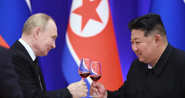 Russian President Vladimir Putin and North Korean leader Kim Jong Un attend a state reception in Pyongyang, North Korea, June 19, 2024. Sputnik/Vladimir Smirnov/Pool via REUTERS