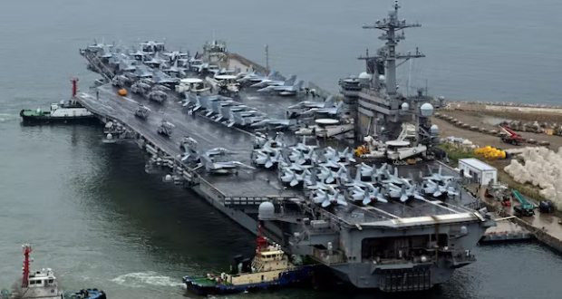 A nuclear-powered U.S. aircraft carrier, the Theodore Roosevelt, arriving in the South Korean port city of Busan earlier this month to take part in joint military exercises with the host nation and Japan/File Photo