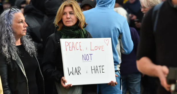 Protesters across England rallied against racism and in support of refugees [Peter Powell/EPA]